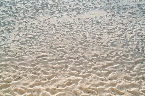 Top view of sandy beach.Background with copy space and visible dirty sand tex Stock Photos