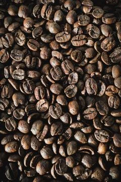 Top View of Scattered Coffee Beans Stock Photos