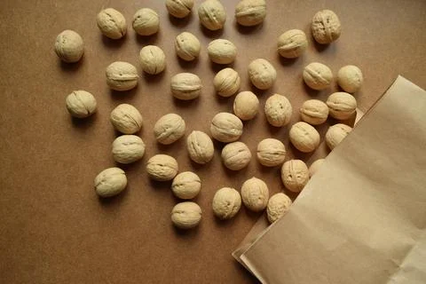 A top view of scattered walnuts Stock Photos