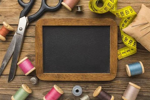 Top view scissors with measuring tape chalkboard Stock Photos
