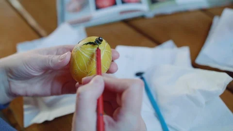 Top view of scratching the pattern on easter egg Stock Footage 115053403