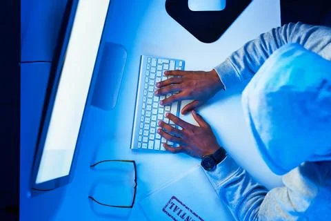 Top view, screen or man hacking computer for cybercrime, malware or phishing for Stock Photos