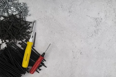 Top view screws with screwdriver Stock Photos