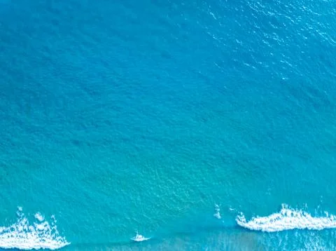 Top view sea surface waves texture background Photos