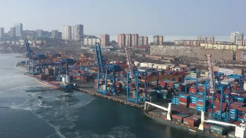 A top view of the seaport container terminal and city. Stock Footage 170102382