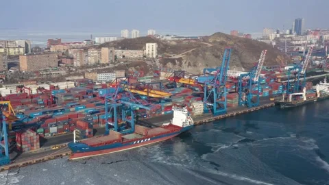 A top view of the seaport container terminal and city. Stock Footage 171309437