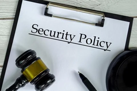 Top view of Security Policy text on white paper clipboard with gavel. secur.. Stock-Fotos