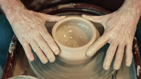 Top view Senior man making a cup during pottery art. Stock Footage 157653097