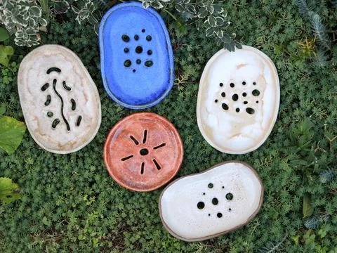 Top view of a set of handmade ceramic soap dishes in wabi-sabi Stock Photos