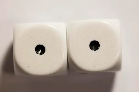 Top view of a set of white dice showing a two 스톡 사진