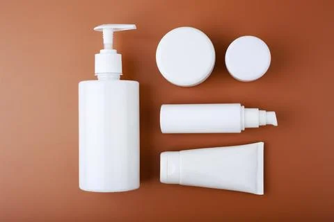 Top view of set with wide range of beauty products for daily skin care routine Stock Photos