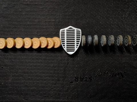 Top view Of Shield Security Icon Stopping black coins from falling. As white Stock Photos