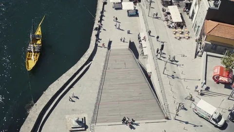 Top view ship sails on the river. Shipping in Porto, Portugal, lot of tourist Stock Footage 80724614