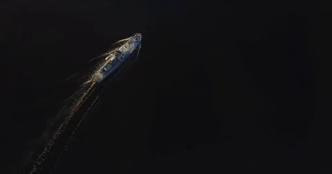 Top view of ship on water surface in the light of sun Stock Footage 78706836