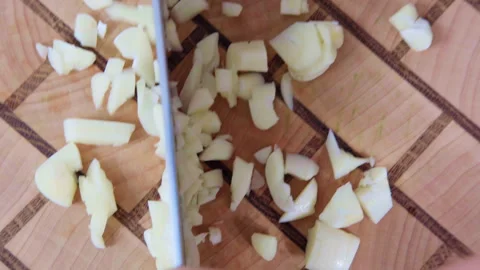 Top view shot of chef hands using professional kitchen knife for cutting fresh Stock Footage 250016119