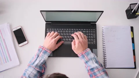 Top view shot of hands typing on laptop computer on workplace Stock Footage 171543190