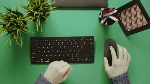 Top view shot of man using keyboard and showing thumbs with chroma key on Stock Footage 81200052