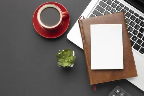 Top view shot of office elements on a dark gray background Stock Photos
