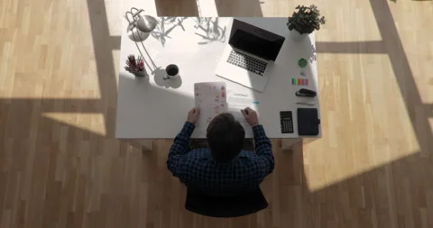 Top view shot of an office worker checking documents and falling asleep with Video stock 139399726