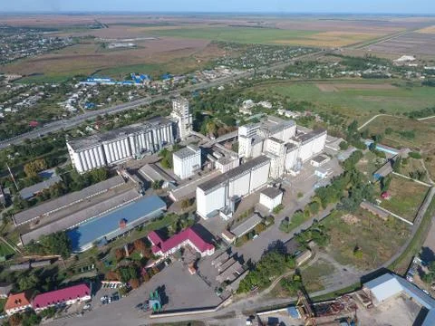 Top view of a silo elevator. Aerophotographing industrial object. Stock Photos