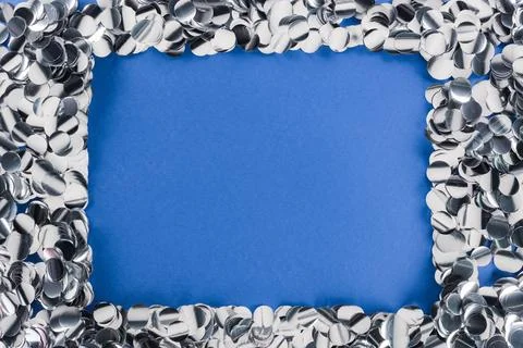 Top view silver confetti frame Stock Photos