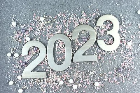 Top view silver numerals with the new year on a silver monochrome background Stock Photos