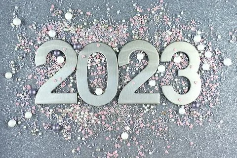 Top view silver numerals with the new year on a silver monochrome background Stock Photos