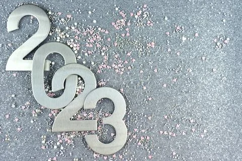 Top view silver numerals with the new year on a silver monochrome background Stock Photos