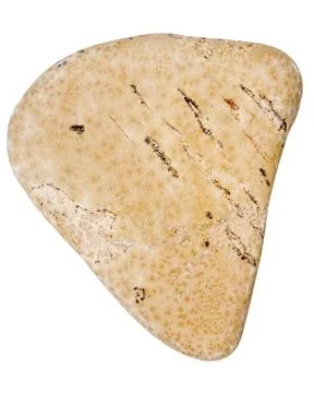 Top view of single yellow pebble Stock Photos