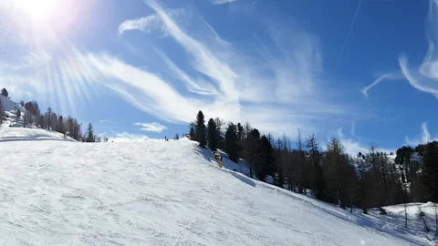 Top view of the ski slope from which people are riding against the background of Stock Footage 141440388