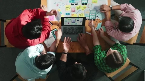 Top view of skilled manager using laptop working on Ux Ui design. Convocation. Stock Footage 267470080