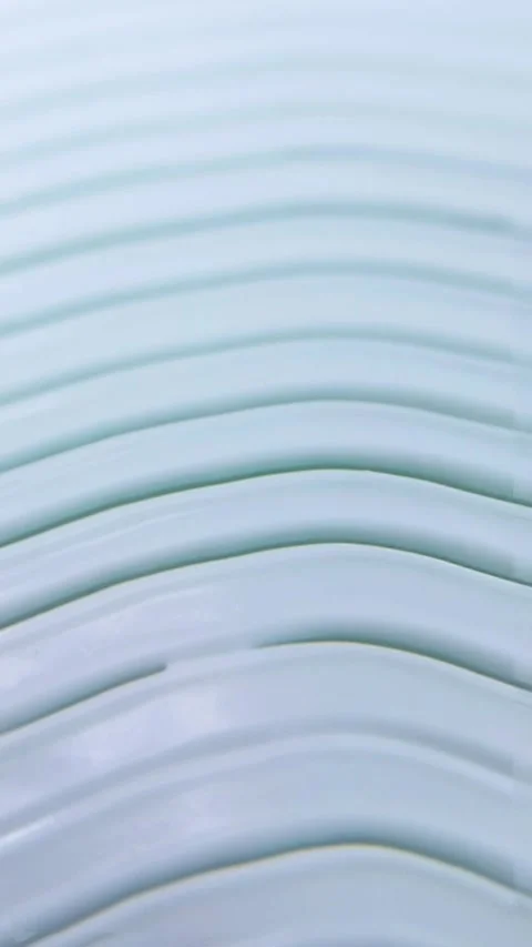 Top view of skin cream featuring static wave motion. Abstract visual of bea.. Stockbeeldmateriaal 339899215