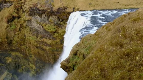 Top view Skogafoss powerfull waterfall in iceland Popular tourist attraction Stock Footage 100765573
