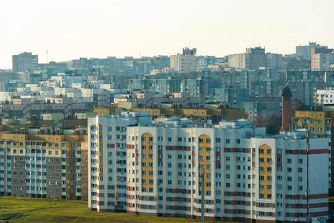 Top view of the sleeping area of a big city. Autumn city landscape. Green spa Stock Photos