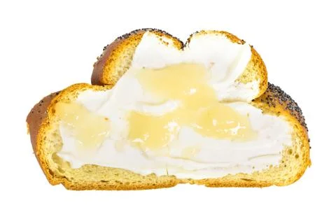Top view of slice of challah bread with cottage cheese and honey Stock Photos