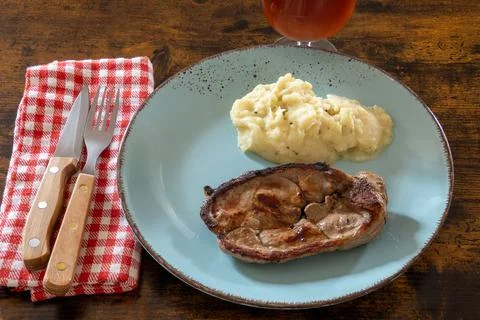 Top view of a slice of lamb with mashed potatoes on a plate Stock Photos