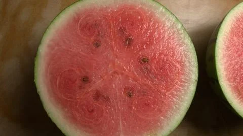 Top view of sliced watermelon on a rustic wooden table Stock Photos