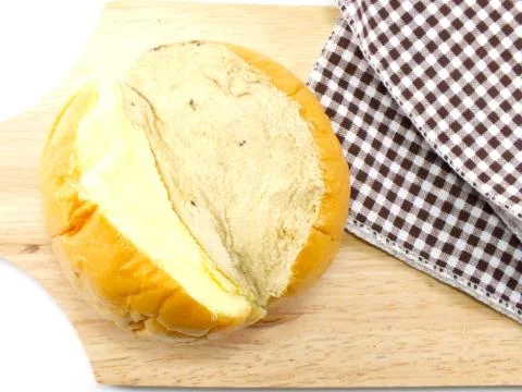Top view of slices bread with butter on a rustic wooden cutting board wooden  Stock Photos