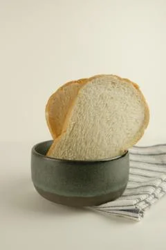 Top view slices of bread on white background Stock Photos