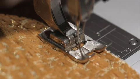 Top view slow motion close up macro sewing machine needle sewing fabric Stock Footage 152916299