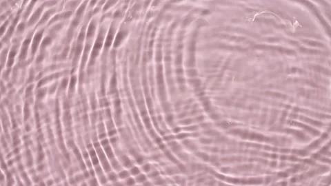 Top view slow motion of drop falls into water and diverging circles of water on Stock Footage 164122613