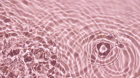Top view slow motion of drop falls into water and diverging circles of water on Stock Footage 165056372