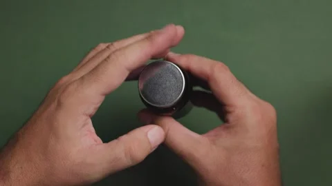 Top view slow motion of man hands opening medicine pill bottle on green Stock Footage 343449875