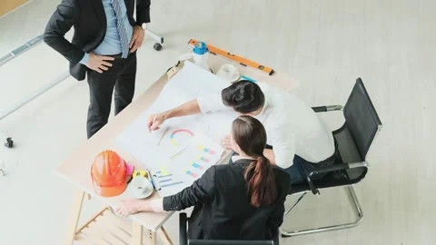 Top view Slow Motion. professional  Engineer meeting Designers and brainstorm Stock Footage 153659453