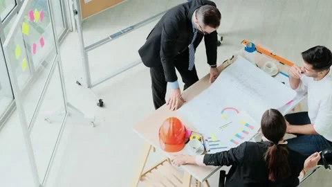 Top view Slow Motion. professional  Engineer meeting Designers and brainstorm Stock Footage 153659732