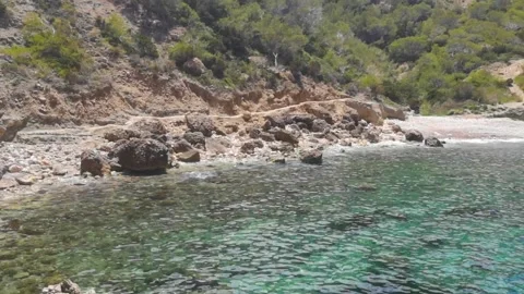 Top view of small beach in Ibiza. 動画素材 136704576