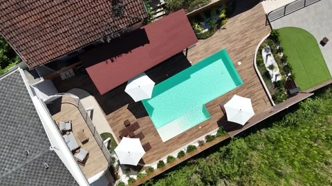 Top view of small beautiful villa with swimming pool and terrace Stock Footage 297907816