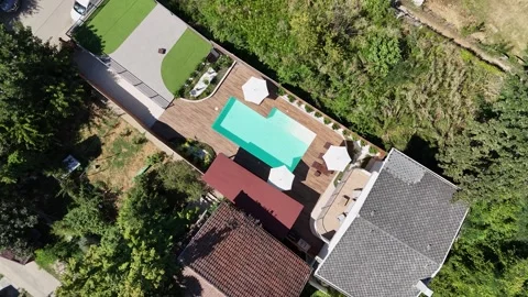 Top view of small beautiful villa with swimming pool and terrace Stock Footage 297908437