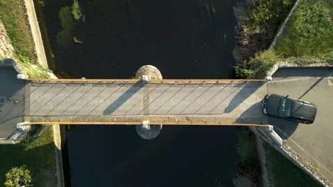 Top View Of A Small Concrete Bridge Over River. Aerial Shot Stock Footage 253487060
