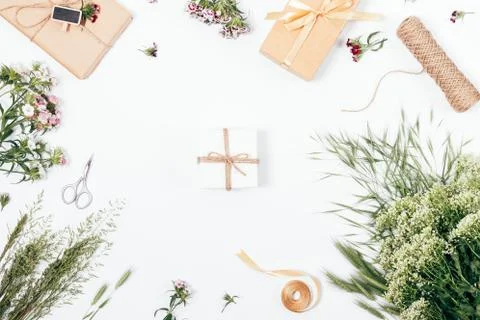 Top view small gift box among festive vintage arrangement Stock Photos